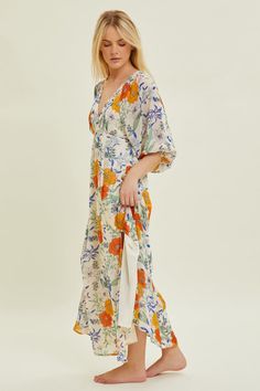 Floral Chiffon Maxi Dress. 100% Polyester Runs true to size. Model is wearing a small (32” bust, 26” waist, 35” hips, 5’2”) Bust Waist Length Sleeve Length Small 34 inches 30 inches 51 inches 17 inches Medium 36 inches 32 inches 51 inches 17 inches Large 38 inches 34 inches 52 inches 17 inches We measure each item from side seam to side seam, on a flat surface. Please consider the fabric content of each item, as fabric containing stretch may have give. White V-neck Chiffon Summer Dress, Bohemian Beach Midi Chiffon Dress, Bohemian Midi Chiffon Beach Dress, Bohemian Midi-length Chiffon Beach Dress, White Bohemian V-neck Chiffon Dress, White Flowy Bohemian Chiffon Dress, White Bohemian Chiffon V-neck Dress, Flowy White Bohemian Chiffon Dress, Beach Fitted Floral Print Chiffon Dress