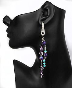 td {border: 1px solid #ccc;}br {mso-data-placement:same-cell;} Sleeping Beauty and purple Kingman mine turquoise pair with amethyst and sterling silver to create an asymmetrical pair of earrings that honor the white orchid vanilla. An approximate 4.5" drop. The necklace Beautiful Turquoise pairs nicely, found in the White Orchid Collection. Turquoise Sterling Silver Earrings With Gemstone Accents, Elegant Turquoise Gemstones In Sterling Silver, Sterling Silver Gemstone Beads Dangle Earrings, Sterling Silver Dangle Earrings With Gemstone Beads, Purple Sterling Silver Fusion Jewelry, Royal Earrings, Orchid Collection, Shoulder Duster Earrings, Silver Chandelier Earrings