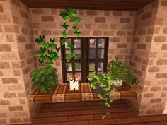 a living room filled with lots of plants next to a window covered in green leaves