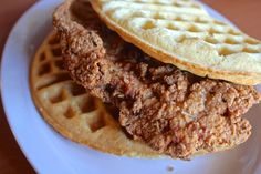 two fried chicken and waffles on a plate