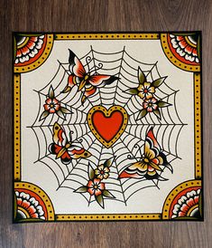 a spider web with hearts and butterflies in the center on a wood background, painted by hand