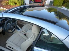 the interior of a car is clean and ready to be driven by someone in their driveway