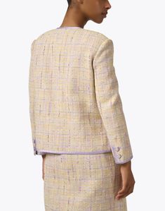 St. John is known for their commitment to classic American luxury, and this tweed jacket is no exception. Featured in a spring-forward color combination, a lavender tweed complements its all-over yellow hue. Designed with buttons along the front and flap pockets, this collarless topper will add a chic touch to any ensemble. Pair it with the coordinating dress and nude heels for a look that is sure to impress. Yellow And Lavender, Skirt And Top Dress, Work Accessories, Spring Forward, Nude Heels, Classic American, Tweed Jacket, Color Combination, Skirt Top