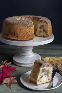 a bundt cake on a plate with a slice cut out