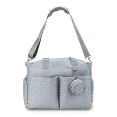 the grey diaper bag has two compartments and is attached to it's shoulder strap