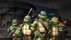 the teenage mutant turtles are standing next to each other