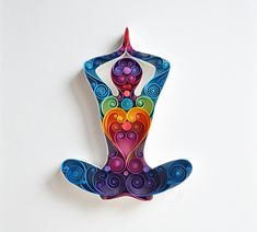 a colorful art piece depicting a person doing yoga with their arms in the air and heart shapes