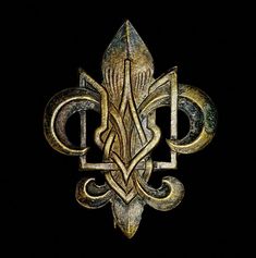 a gold fleur de lis on a black background