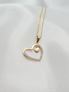 14K(585) Solid Gold Love Necklace. Dimond Cut Pendant. True Love Necklace For Her! Total Gram Weight: 2.68 gr (chain and pendant) * More Details: The Chain is available for sale individually. Please message me for more details! Chain Style: Flat Cable  Chain Length: 17 3/4 inches  Chain Thickness: 1 millimeter * More Details: The Pendant is available for sale individually. Please message me for more details! Pendant Style: Love/Heart ( Cubic Zirconia Stone ) Pendant Weight: 0.83g Pendant Length: 19 mm (millimeter) Pendant Width: 14 mm  * ALL MY JWELERIES ARE MADE OF HIGH QUALITY SOLID GOLD ONLY, AND I DO NOT CARRY ANY ''GOLD PLATED/FILLED MATERIAL'' ITEMS.  To learn more and see the differences please visit my home page and go to the bottom of the page (About GoldLuxGalleria section)   htt Valentine's Day Diamond Pendant Necklace For Anniversary, Double Heart Diamond Necklace For Valentine's Day Gift, Valentine's Day Heart Cut 14k Gold Necklace, Gold Heart Pendant Diamond Necklace For Valentine's Day, Gold Diamond Necklace For Wedding On Valentine's Day, 14k Gold Heart Cut Necklace For Valentine's Day, Valentine's Day 14k Stamped Heart Cut Necklace, Valentine's Day Heart Cut Necklace Stamped 14k, Valentine's Day Diamond Necklace With Accents