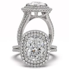 a cushion cut diamond ring with double halos