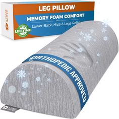 the memory foam comforter has snowflakes on it and is in front of a box