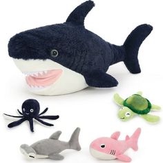 stuffed animals that look like sharks and octopuses