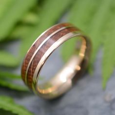 Comfort Fit Yellow Gold Un Lado Asi Wood Ring with 14k Recycled Yellow Gold  Rich brown nacascolo wood with a side stripe and offset line of recycled 14k yellow gold exterior with contoured  interior. The contoured comfort fit band offers extreme durability and a lightweight and comfortable ring. Available in any wood you choose! An excellent choice of wedding band or commitment ring, this design also pairs nicely with an engagement ring, or a partner's matching or complimentary wood wedding band. Each ring is made to order in the size you request. This listing is for a 7mm width, but other widths are available by request Rings are available in whole, half and quarter sizes. If you would like another width, please contact us for a custom listing. This ring can also be customized with other Commitment Ring, Commitment Rings, Yellow Ring, Wood Wedding Band, Yellow Rings, Yellow Gold Wedding Ring, Organic Jewelry, Ring Mens, Wood Ring