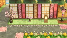 an animal crossing the street in front of a building with flowers and trees on it