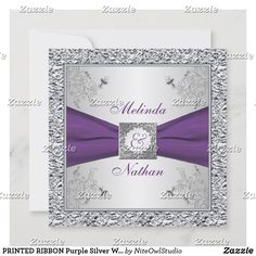 an elegant wedding card with purple ribbon and silver foil on the front, is shown