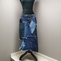 "Upcycled denim patchwork skirt with frayed seams. Waist measures 24\" and length is approximately 29\"." Upcycled Denim Jacket, Patchwork Denim Skirt, Womens Skirts, Patchwork Skirt, Upcycled Denim, Denim Patchwork, Overall Dress, Unique Dresses, Lace Design