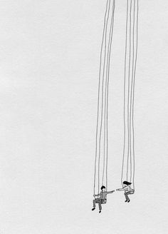 two people are hanging upside down in the air with their feet dangling from wires above them