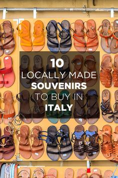 many pairs of shoes are displayed in front of a yellow wall with the words 10 locally made souvenirs to buy in italy