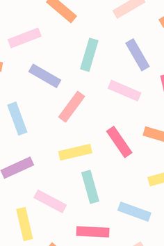 multicolored confetti on white background