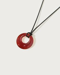 Carnelian Black Cord Necklace | En Route Jewelry | En Route Jewelry En Route Jewelry, Work Necklaces, Black Cord Necklace, Chakra Racine, Carnelian Necklace, The Root Chakra, Carnelian Stone, Instagram Tags, Root Chakra