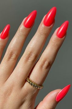 Upgrade your nail game with our twisted tidal ring, the perfect compliment to any statement nail look. 💅🏼 The elegant gold and gemstone design adds a touch of sophistication and glam to any outfit. Plus, the vibrant red nails featured in this picture are sure to make a bold statement. Shop now and elevate your accessory game! 💍 #rednails #summernails #springnails #nailart #erastournails #goldjewelry #goldrings #minimalistic Nail Colors For Tanned Skin, Red Coral Nails, Coral Red Nails, Funky Nail Ideas, Lady Nails, Coral Nails With Design, Nail Spot, Jelly Polish, Nail Vibes