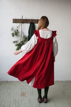 Victorian style inspired pinafore dress with flutter sleeve made from 100% soft and washed Oeko-Tex certified linen Details: - Composition: 100% Oeko-Tex certified linen - Colour: red - Coconut buttons down the back - Size: XS-S, M, L-XL - Medium weight linen - Linen care: machine wash gentle; tumble dry low, ironing optional - The price is for one pinafore dress, other pictured items are not included Linen Daywear Dress With Ruffles, Linen Ruffle Dress For Daywear, Relaxed Fit Linen Dress With Ruffles, Relaxed Fit Linen Ruffle Dress, Pinafore Dress Outfit, Comfy Trendy Outfits, Dress With Wings, Dress With Flutter Sleeves, Dress Linen