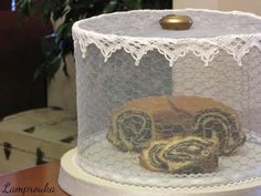 there is a cake in the net on the table