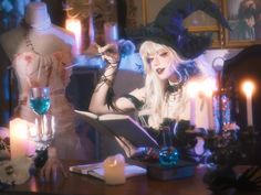 a woman dressed as a witch reading a book in front of candles and mannequins