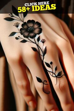 a woman's hand with black flowers on it and the words, click here