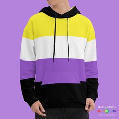 Stay cozy and warm whilst showing off your non-binary pride in this amazing non-binary flag hoodie. For anyone who wants to show their gender identity there is no better outfit for pride month, LGBTQ+ pride events and festivals. If you love bold non-binary clothing this enby pride sweatshirt with hood is a must-have item. STYLE GUIDE• Stylish loose fit• Cozy and soft• Vibrant colors• Brushed fleece fabric inside• Double-lined hood with design inside and out• All-over print hoodie - inside is whi Print Clothes Design, Pride Outfit Nonbinary, Trendy Cotton Color Block Hoodie, Nonbinary Clothes, Outfit For Pride, Transmasc Nonbinary Flag, Lgbtq Clothes, None Binary Flag, Non Binary And Bisexual