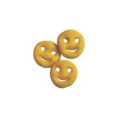 three donuts with smiley faces on them