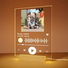 an image of a music player displayed on a glass block