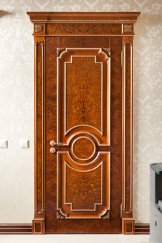 an ornate wooden door in the corner of a room