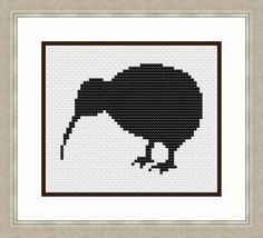 an image of a black bird in a frame