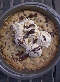 a chocolate chip cookie with ice cream on top