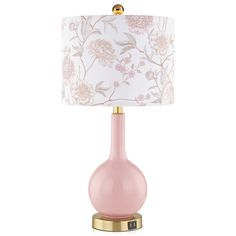 a pink table lamp with a gold base and white lampshade on the top