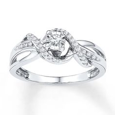 a white gold ring with diamonds on it