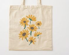 a tote bag with yellow flowers on it