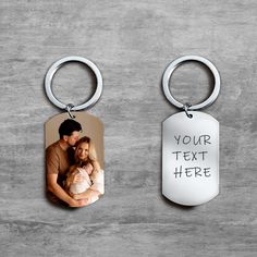 two personalized key chains with an image of a man and woman holding a baby