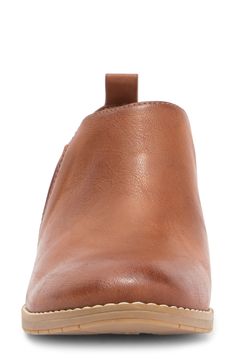 This versatile slip-on shoe takes style cues from booties and features elastic side gores for ease of fit. 1.25" heel Round toe Elastic side gores Slip-on Lightly padded insole Manmade upper and sole Imported Brown Slip-on Booties Medium Width, Winter Travel Essentials, Stocking Stuffers For Kids, Leggings And Socks, Leather Decor, Wide Shoes, Clutch Pouch, Shoe Sale, Girls Accessories