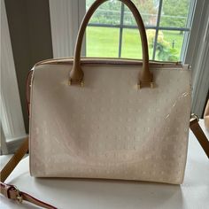 Cream Arcadia. Carried For 1 Week. Has Cross Body Strap. Smoke Free Home. Only Reason I Am Selling Is I Like An Open Top Better. Very Classy. Does Have A Small Mark On The Back But It Came That Way. Still Has Original Acadia Paper In Pocket. Picture Of Spot Added. Carry On, Bag Lady, Cream, Things To Come, Women Shopping, Color