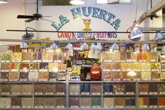 the inside of a store filled with lots of food and condiments on display