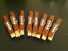 several pieces of brown leather with white crosses on them sitting on a black counter top