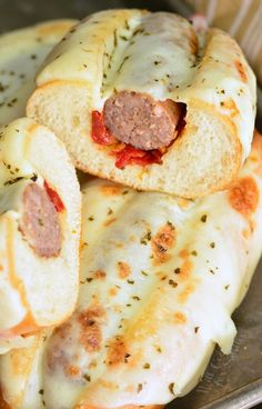 sausage and cheese bread rolls on a plate