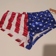 Red White And Blue Patriotic Hot Pants Shorts Perfect For Wonder Woman Costume. Stretchy Shiny Lemon Fabric. Pre-Owned Tried On But Never Used, Tag Still Attached. Size Medium. Elastic Waistband. Wonder Woman Shorts, Lemon Fabric, Woman Shorts, Hot Pants Shorts, Woman Costume, Wonder Woman Costume, Women's Costumes, Red White And Blue, Red And Blue