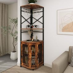 a living room filled with furniture and a potted plant on top of a shelf