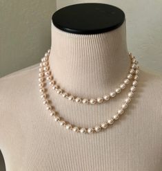 Vintage single strand of pearls is 36 inches in length.. ... but is versatile and can easily be worn as a double strand as seen in the pictures. The pearls are a creamy white hue. The clasp is a shepherd's hook style. Great classic piece of costume jewelry. The pearls are in lovely vintage condition! Classic Long Necklace For Formal Occasions, 50s Necklace, White Pearls Necklace, 60s Jewelry, Alien Halloween, Vintage Pearl Necklace, Pearl Rope, Classic Pearl Necklace, 1960s Jewelry