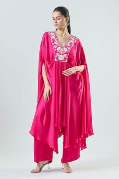 Fuchsia kaftan with thread work embroidery in floral motifs. Paired with matching pant. - Aza Fashions Pink Kaftan With Dabka Work For Navratri, V-neck Kaftan With Chikankari Embroidery For Wedding, Pink Kaftan With Resham Embroidery For Navratri, Pink Anarkali Kaftan For Navratri, Pink Dabka Work Kaftan For Navratri, Pink Embroidered Kaftan For Wedding, Pink Resham Embroidery Kaftan For Navratri, Pink Silk Kaftan With Dabka Work, Pink Kaftan With Dupatta For Navratri