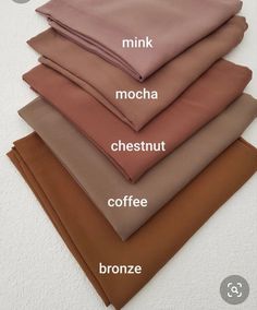 four different colors of sheets with the names on them