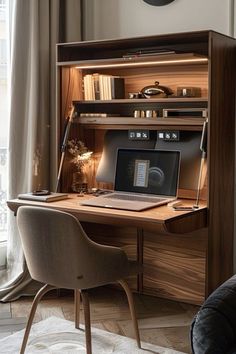 a laptop computer sitting on top of a wooden desk next to a book shelf filled with books